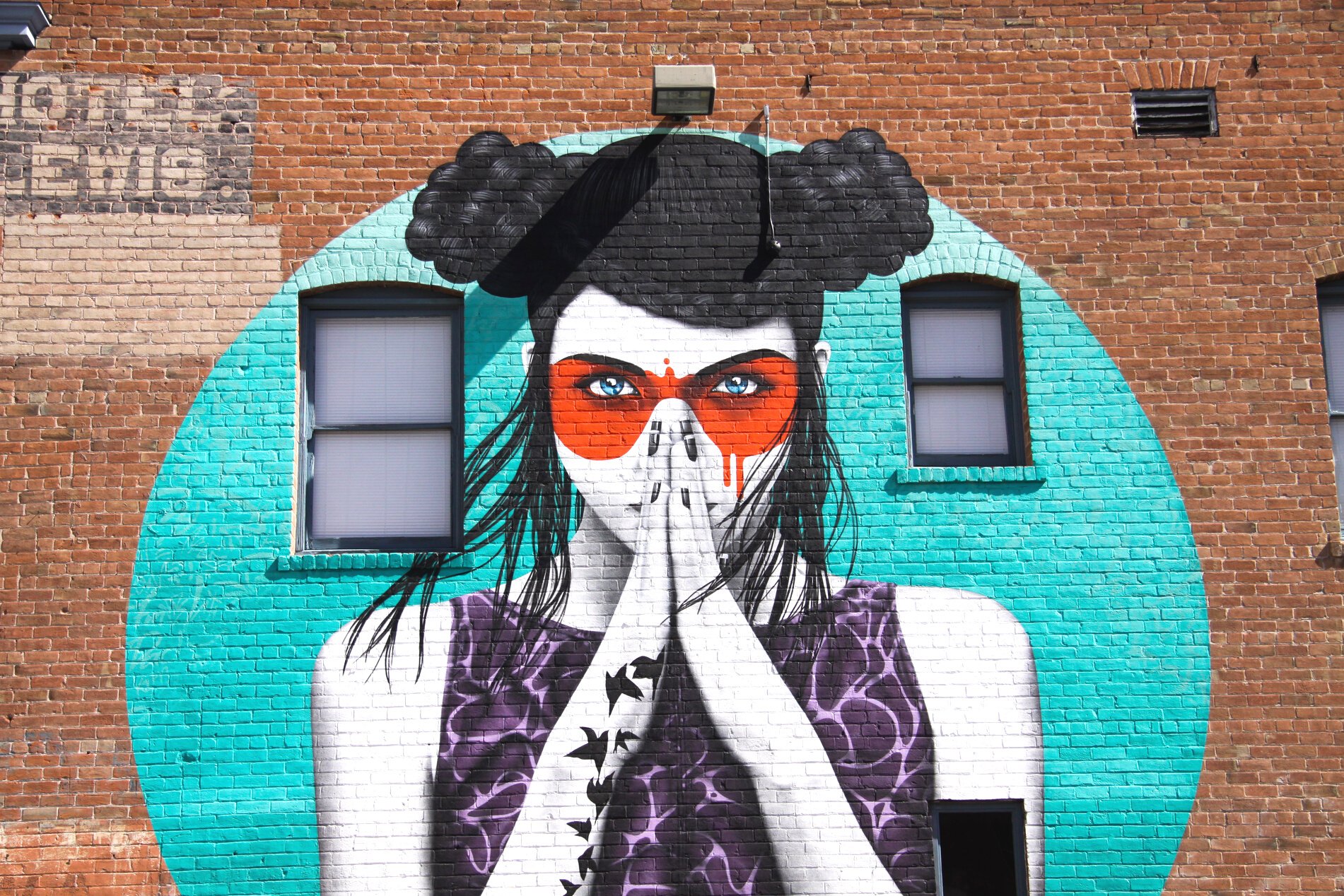 Photo of Graffiti on Brick Wall